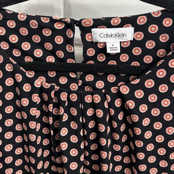 Calvin Klein Women’s Sleeveless Rosette Blouse with Pleated Neckline - Picture 2 of 6